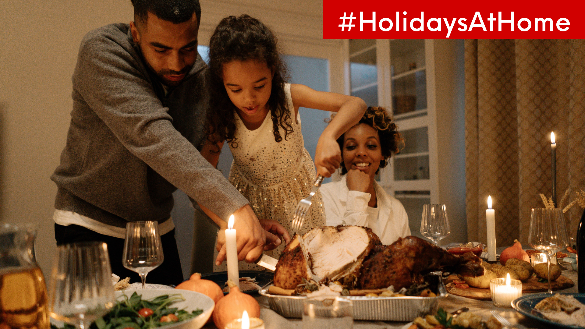 Family celebrating Thanksgiving dinner at home.